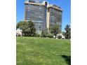 Exterior shot of building with green lawn at 3111 Bel Air Dr # 22B, Las Vegas, NV 89109