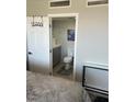 Powder room with sink and toilet located off the main bedroom at 3111 Bel Air Dr # 22B, Las Vegas, NV 89109