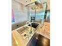 Close up of modern kitchen featuring stainless steel appliances and a sleek, minimalist design at 4381 W Flamingo Rd # 2022, Las Vegas, NV 89103
