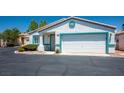 Well-maintained single-story home with a two-car garage and neat landscaping at 5099 Mascaro Dr, Las Vegas, NV 89122