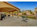 Large backyard with covered patio area, ideal for outdoor entertaining and relaxation at 5642 Breckenridge St, North Las Vegas, NV 89081