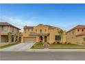 Stunning two-story home with a well-manicured lawn and tasteful landscaping at 5642 Breckenridge St, North Las Vegas, NV 89081