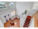 Bright living room features soaring ceilings and large windows for natural light and views at 5642 Breckenridge St, North Las Vegas, NV 89081