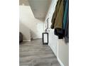 Entryway features wood-look flooring and a white interior door at 6812 Dipper Ave, North Las Vegas, NV 89084
