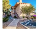 Charming condo complex with a well-manicured landscape and convenient parking at 8450 Alta Dr # 204, Las Vegas, NV 89145