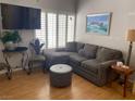 Comfortable living room features a cozy couch and recessed lighting at 8450 Alta Dr # 204, Las Vegas, NV 89145