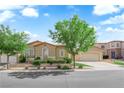 Beautiful single-story home with a well-manicured lawn and a two-car garage, perfect for suburban living at 9375 Gold Lake Ave, Las Vegas, NV 89149