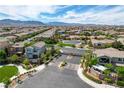 Expansive aerial view of the Teton community featuring single-Gathering homes and mountain views at 10024 Rams Leap Ave, Las Vegas, NV 89166