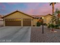 Beautiful one-story home features desert landscaping and a two-car garage at 10058 Saint Augustine St, Las Vegas, NV 89183