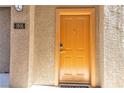 Inviting front entrance with a golden door and clearly marked address number 1916 at 2900 Sunridge Heights Pkwy # 1916, Henderson, NV 89052