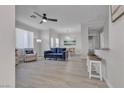 Open-concept living area boasts lots of natural light and flows into the adjacent dining room at 2900 Sunridge Heights Pkwy # 1916, Henderson, NV 89052