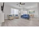 Comfortable and stylish living area with a TV and dining area adjacent to the living space at 2900 Sunridge Heights Pkwy # 1916, Henderson, NV 89052