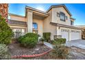 Beautifully maintained home with mature shrubs and convenient three-car garage at 6971 Cedar Basin Ave, Las Vegas, NV 89142