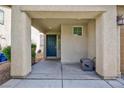 Inviting front porch with a sturdy door, offering a warm welcome to guests and residents at 9039 Alex Creek Ave, Las Vegas, NV 89149