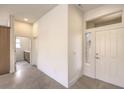 Welcoming entryway featuring a light-filled foyer and a view into an adjacent room at 10421 Linfield Pl, Las Vegas, NV 89134