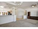 Open-concept living room featuring neutral walls, carpet flooring, and recessed lighting fixtures at 2315 Sun Cliffs St, Las Vegas, NV 89134