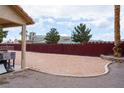Spacious backyard patio area, perfect for outdoor gatherings and entertaining, with a sturdy brick perimeter wall at 2916 Drury St, Las Vegas, NV 89108