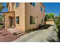 Beautiful home with a long driveway, brick-lined steps and a convenient attached garage at 6437 Boatbill St, North Las Vegas, NV 89084