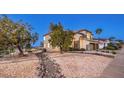 Charming home with low-maintenance desert landscaping and inviting curb appeal at 722 Descartes Ave, Henderson, NV 89002