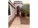 Close-up shot of a walkway and decorated gate at the front entrance at 8616 Willow Cabin St, Las Vegas, NV 89131