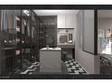 Walk-in closet with glass doors and custom storage solutions and herringbone floor at 924 S First St # 302B, Las Vegas, NV 89101
