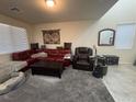 Comfortable living room showcasing a plush rug and relaxed seating at 933 Kimbark Ave, Las Vegas, NV 89148