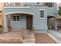 Inviting front entrance featuring a secure screen door, stone steps, and an arched porch at 10373 Perfect Parsley St, Las Vegas, NV 89183