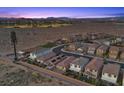 Expansive aerial view of community, mountains, desert landscape, and recreation area with ballfields at 10431 Seelos St, Las Vegas, NV 89178