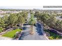Aerial view of the Royal Highlands neighborhood featuring tree-lined streets and well-maintained landscaping at 10902 Pentland Downs St, Las Vegas, NV 89141