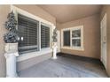 Charming entryway featuring decorative columns and ample natural light streaming through the windows at 2152 Jasper Bluff St # 103, Las Vegas, NV 89117