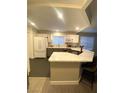 This modern kitchen has white cabinets, quartz countertops, and stainless steel appliances at 2813 Painted Rose Ln, Henderson, NV 89074