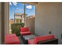 Relaxing outdoor patio space with comfortable seating, perfect for enjoying the fresh air and neighborhood views at 3531 Montepulciano Ln, Henderson, NV 89044