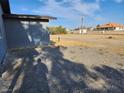 View of the backyard area featuring bare ground at 4231 E Kellogg Rd, Pahrump, NV 89061