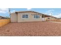 Charming single-story home with a covered carport and low-maintenance landscaping in the front yard at 49 Constitution Ave, Henderson, NV 89015