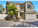 Two-story home featuring desert-friendly landscaping at 8754 Brindisi Park Ave, Las Vegas, NV 89148