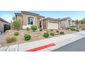 Well-maintained single-story home with a tile roof, desert landscaping, and ample curb appeal at 10601 Skye Arroyo Ave, Las Vegas, NV 89166
