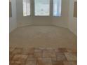 Spacious living area with bay window that offers lots of natural light at 10816 Elm Ridge Ave, Las Vegas, NV 89144