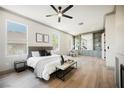 Elegant main bedroom with built-in shelving, fireplace, and a neutral color palette at 2177 Magnolia Pond Ct, Henderson, NV 89052