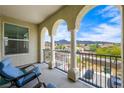 Relaxing covered balcony with stunning views and seating for lounging at 2555 Hampton Rd # 9307, Henderson, NV 89052