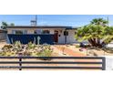 Charming single-story home with xeriscaped front yard, mature landscaping and gated entry at 3308 Navajo Way, Las Vegas, NV 89108