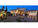 Charming single-story home boasting a tile roof, desert landscaping, and an attached garage at 5416 Alabaster Ct, Las Vegas, NV 89149