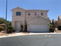Charming two-story home with a two car garage and desert landscaping in a quiet neighborhood at 10357 Bent Willow Ave, Las Vegas, NV 89129