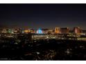 Spectacular night view of the Las Vegas skyline, showcasing the vibrant lights and iconic landmarks at 3111 Bel Air Dr # 20H, Las Vegas, NV 89109