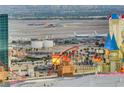 Las Vegas city view from a high vantage point overlooking McCarran Airport and the Excalibur hotel at 4525 Dean Martin Dr # 2901, Las Vegas, NV 89103