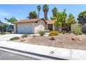 Inviting single-story home featuring desert landscaping and an attached garage at 4916 Carmichael Ave, Las Vegas, NV 89110