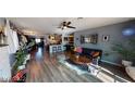 Inviting living space showcases stylish furniture, plants, and eclectic decor at 5817 Rae Dr, Las Vegas, NV 89108