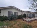 Attractive single-story home featuring well-maintained landscaping at 600 Woodmount Dr, Las Vegas, NV 89107