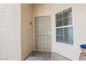 Welcoming entry with secure screen door and window bringing in natural light at 7400 W Flamingo Rd # 1082, Las Vegas, NV 89147