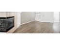 Cozy living room with fireplace, wood floors, and an inviting atmosphere at 7400 W Flamingo Rd # 1082, Las Vegas, NV 89147