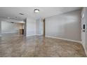 Open living room featuring tile floors and neutral paint at 839 Benita Pl, Boulder City, NV 89005